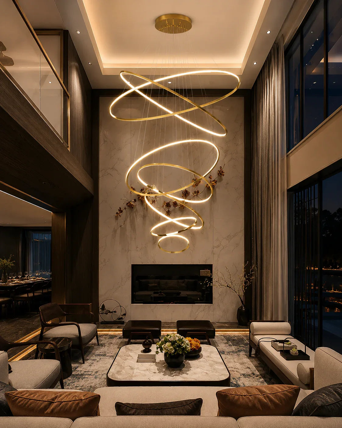 Modern spiral pendant light illuminating luxury living room with marble fireplace and contemporary furniture