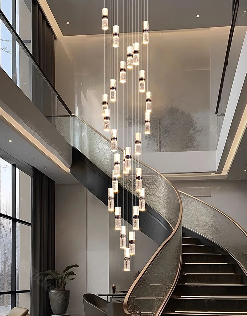 Modern crystal pendant chandelier over spiral staircase, luxury interior lighting design