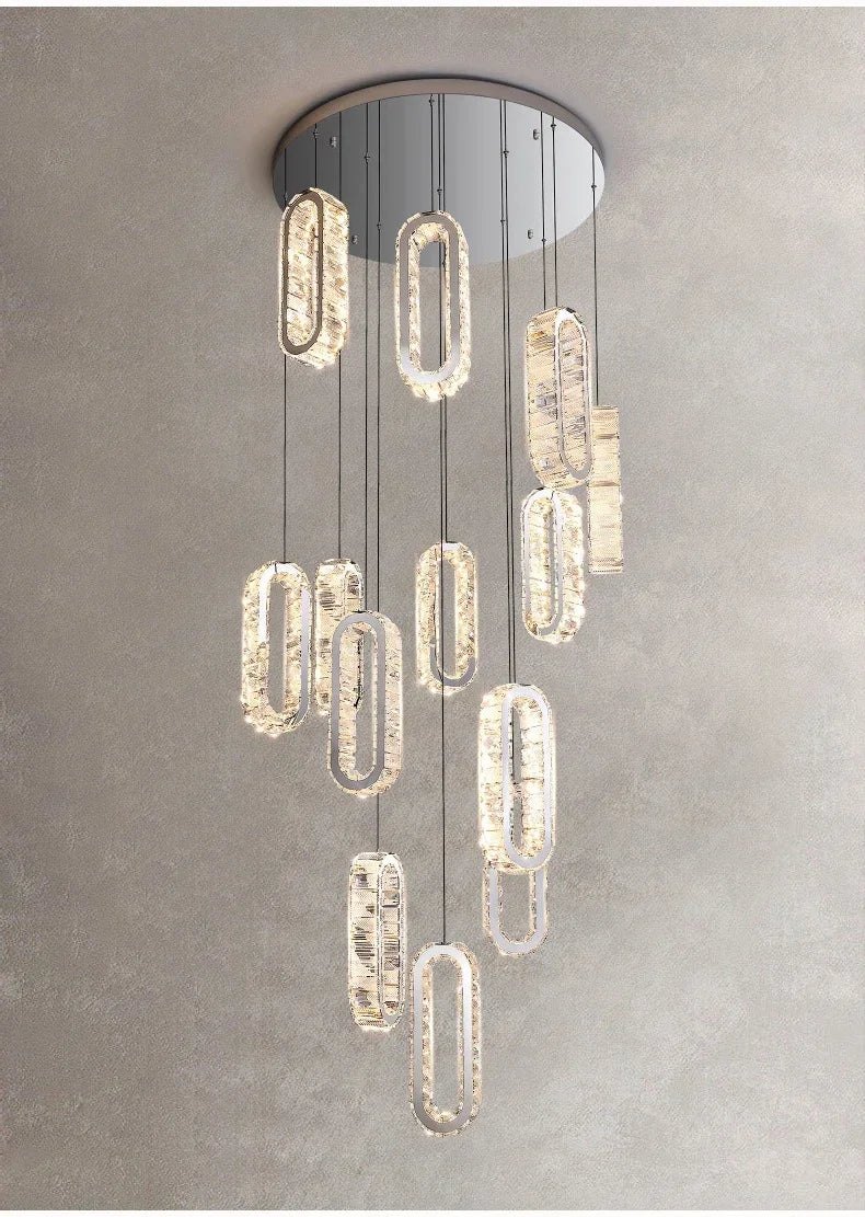 Modern crystal pendant light with cascading oval fixtures for contemporary interior lighting