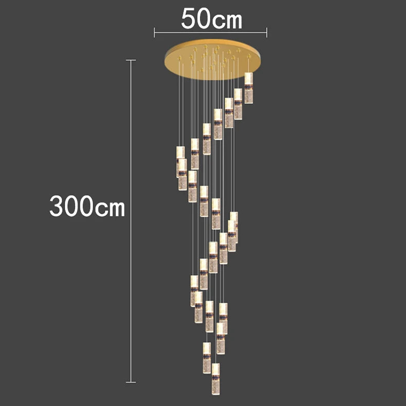 Modern cascading pendant light with 300cm drop, gold canopy, and crystal cylinders for contemporary interiors