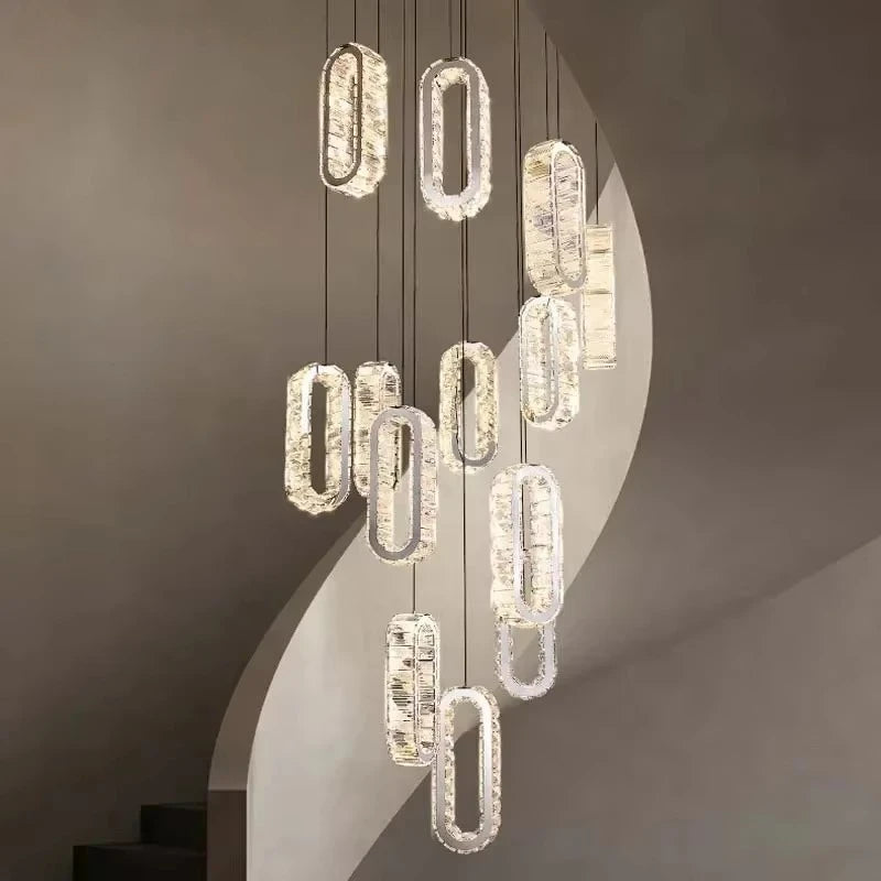 Modern crystal pendant lights with oval fixtures, ideal for contemporary interior lighting design