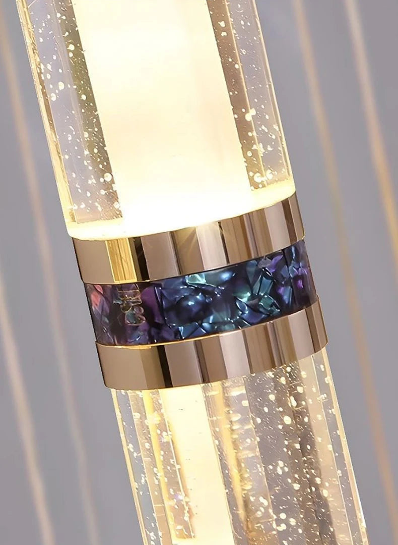 Modern luxury floor lamp with gold accents, crystal-like band, and glowing bubble glass design