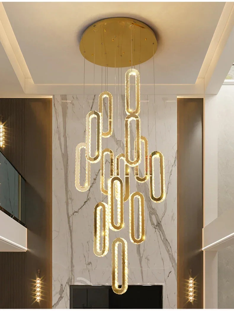 Modern gold pendant light with cascading oval LED fixtures, perfect for luxury interior lighting design