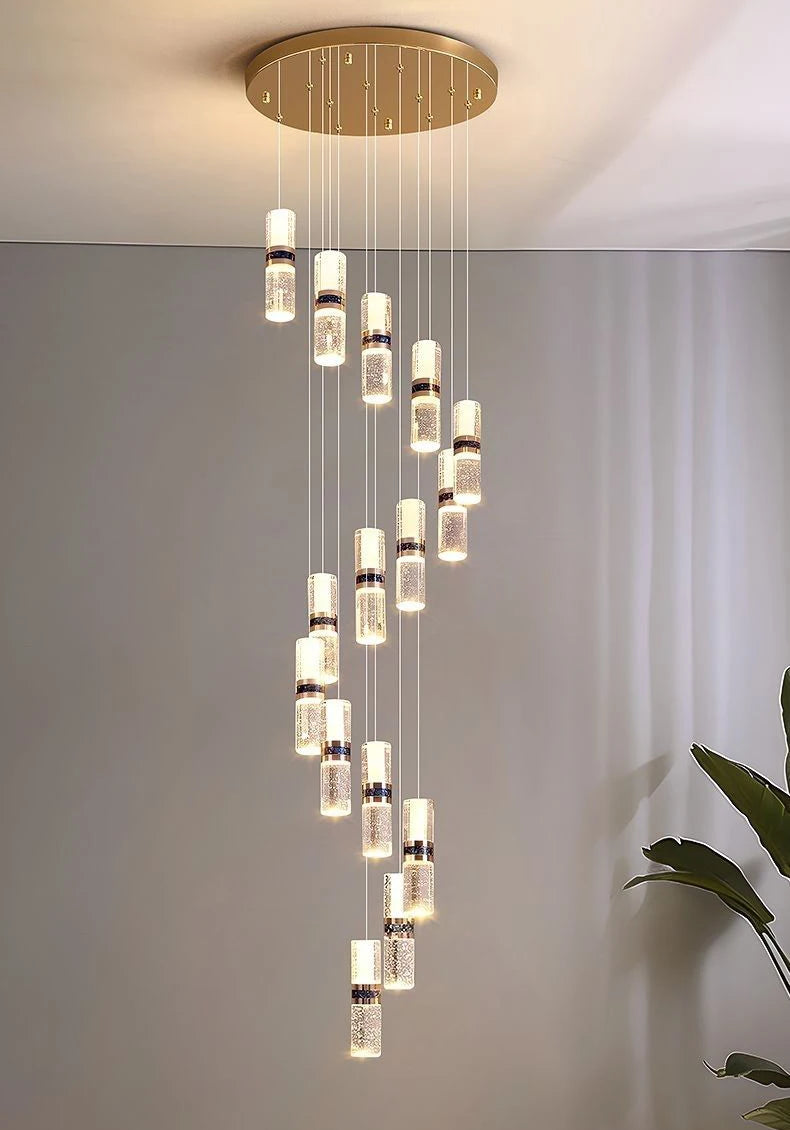 Modern crystal pendant chandelier with cascading cylindrical lights for contemporary interiors