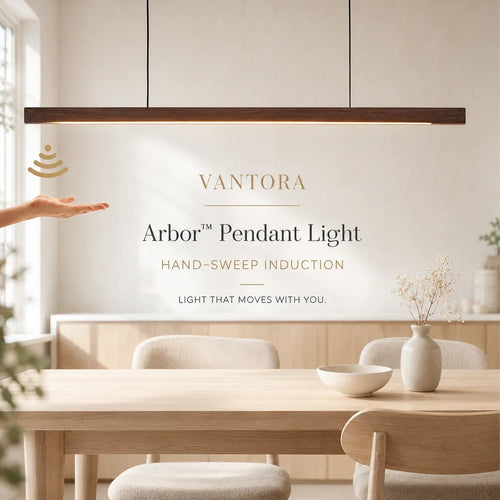 Arbor Pendant Light with black walnut wood body illuminating a modern dining space