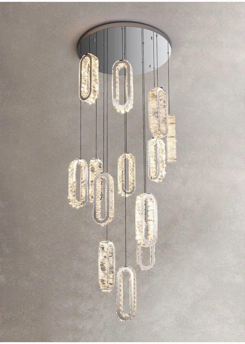Modern crystal pendant light with cascading oval fixtures for contemporary interior lighting
