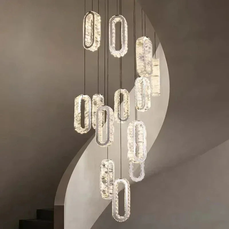 Modern crystal pendant lights with oval fixtures, ideal for contemporary interior lighting design