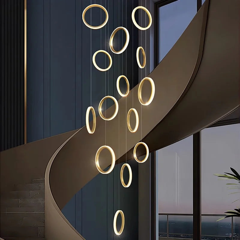 Modern staircase with circular light fixture in a home setting