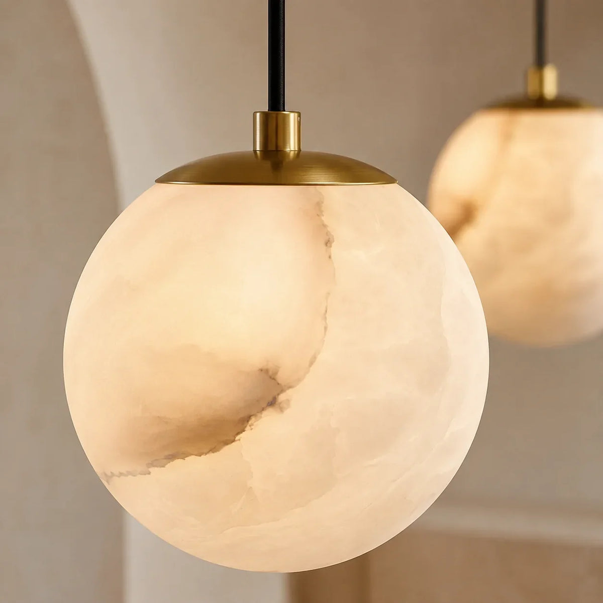 Close-up detail of Solen Cascade Chandelier's alabaster-inspired acrylic shades